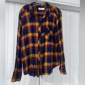 Women’s button up cotton shirt.